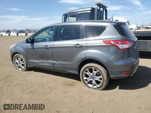 2013 Ford Escape SEL with VIN 1FMCU9H9XDUA25362, listed as a Copart auction lot 52441465 with 167,594 mi miles and Salvage Title. Bid and sale history available at carsss.com. Image 2.
