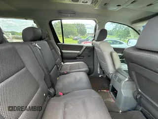 2005 Nissan Armada LE z VIN 5N1AA08A45N703735, wystawiony jako Copart lot #59034285 z przebiegiem 242 012 mil mil oraz Tytuł czysty. Historia ofert i sprzedaży dostępna na DreamBid. Obrazek 6.