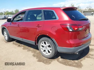 2013 Mazda CX-9 Touring with VIN JM3TB2CV8D0410956, listed as a IAAI auction lot 42643918 with 187,045 mi miles and . Bid and sale history available at DreamBid. Image 3.