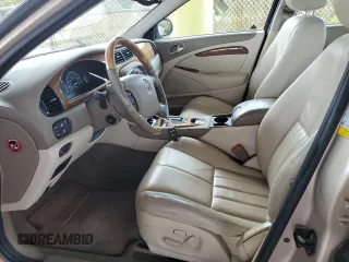 2003 Jaguar S-Type z VIN SAJEA01U53HM58399, wystawiony jako Copart lot #62006044 z przebiegiem 86 841 mil mil oraz Szkoda całkowita • Salvage title. Historia ofert i sprzedaży dostępna na DreamBid. Obrazek 7.