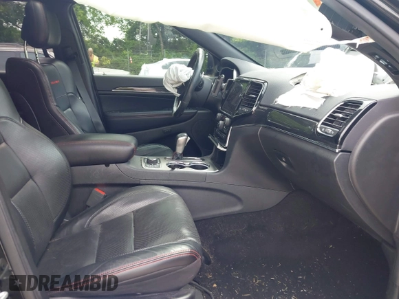 2020 Jeep Grand Cherokee Trailhawk with VIN 1C4RJFLG4LC387459, listed as a IAAI auction lot 42373820 with 55,492 mi miles and . Bid and sale history available at DreamBid. Image 5.
