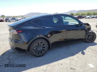 2024 Tesla Model Y Long Range z VIN 7SAYGAEE3RF089122, wystawiony jako Copart lot #52732035 z przebiegiem 15 486 mil mil oraz Szkoda całkowita • Salvage title. Historia ofert i sprzedaży dostępna na DreamBid. Obrazek 3.