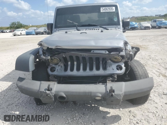 2015 Jeep Wrangler Sport with VIN 1C4AJWAG1FL745444, listed as a Copart auction lot 54062935 with 175,998 mi miles and Salvage Title. Bid and sale history available at carsss.com. Image 5.