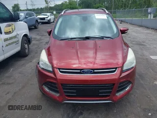 2015 Ford Escape Titanium z VIN 1FMCU0J99FUA92432, wystawiony jako IAAI lot #42257036 z przebiegiem 127 632 mil mil oraz . Historia ofert i sprzedaży dostępna na DreamBid. Obrazek 12.