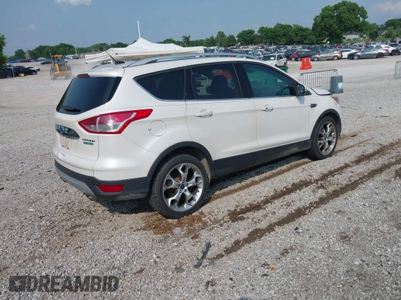 2015 Ford Escape Titanium with VIN 1FMCU0JXXFUA07175, listed as a IAAI auction lot 42447067 with 94,893 mi miles and . Bid and sale history available at DreamBid. Image 4.