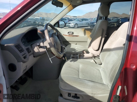 2004 Kia Sedona LX with VIN KNDUP131546612432, listed as a Copart auction lot 87326764 with 156,259 mi miles and Salvage Title. Bid and sale history available at carsss.com. Image 7.
