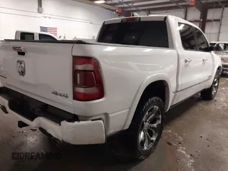 2020 Ram 1500 Limited with VIN 1C6SRFHT7LN319636, listed as a IAAI auction lot 41288661 with 107,029 mi miles. Bid and sale history available at carsss.com. Image 4.