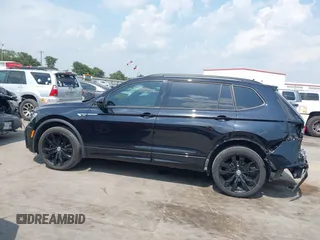 2021 Volkswagen Tiguan SE z VIN 3VV3B7AX0MM047478, wystawiony jako IAAI lot #42144239 z przebiegiem 55 468 mil mil oraz . Historia ofert i sprzedaży dostępna na DreamBid. Obrazek 15.