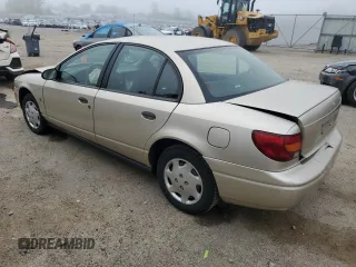 2002 Saturn SL z VIN 1G8ZH52892Z100073, wystawiony jako Copart lot #57023065 z przebiegiem 160 442 mil mil oraz Nie do naprawy. Historia ofert i sprzedaży dostępna na DreamBid. Obrazek 2.