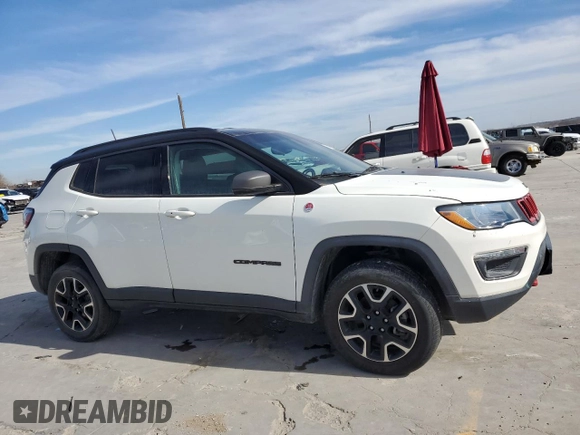 2020 Jeep Compass Trailhawk with VIN 3C4NJDDB3LT189398, listed as a Copart auction lot 88671285 with 75,672 mi miles and Salvage title. Bid and sale history available at DreamBid. Image 4.