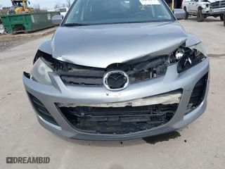 2010 Mazda CX-7 SV with VIN JM3ER2W58A0302929, listed as a IAAI auction lot 41839473 with 163,416 mi miles. Bid and sale history available at carsss.com. Image 6.