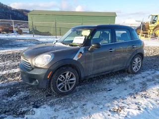 2013 MINI Cooper Countryman with VIN WMWZB3C58DWM31146, listed as a IAAI auction lot 41423661 with 97,505 mi miles. Bid and sale history available at carsss.com. Image 2.