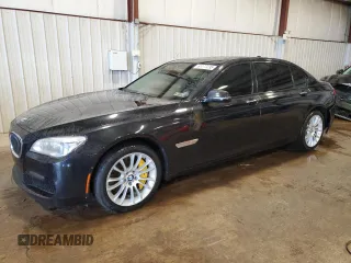 2014 BMW 7 Series ALPINA B7 xDrive with VIN WBAYF8C53ED652566, listed as a Copart auction lot 61177235 with 144,566 mi miles and Salvage title. Bid and sale history available at DreamBid. Image 1.