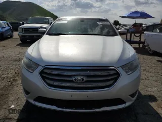2015 Ford Taurus SEL with VIN 1FAHP2E88FG121647, listed as a Copart auction lot 51660585 with 155,686 mi miles and Clean Title. Bid and sale history available at DreamBid. Image 5.