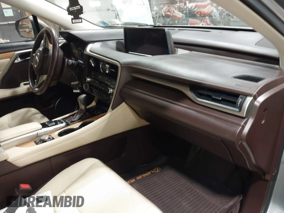 2018 Lexus RX 450hL Premium z VIN JTJDGKCA6J2004313, wystawiony jako IAAI lot #42270567 z przebiegiem 72 692 mil mil oraz . Historia ofert i sprzedaży dostępna na DreamBid. Obrazek 5.