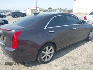 2015 Cadillac ATS Sedan Luxury RWD with VIN 1G6AB5RA6F0107167, listed as a IAAI auction lot 41935673 with 136,440 mi miles. Bid and sale history available at carsss.com. Image 4.