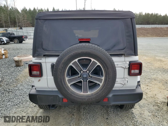 2023 Jeep Wrangler Sahara with VIN 1C4HJXEN1PW598815, listed as a Copart auction lot 42964275 with 29,458 mi miles and Salvage Title. Bid and sale history available at carsss.com. Image 6.