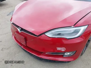 2019 Tesla Model S 100D z VIN 5YJSA1E46KF332066, wystawiony jako IAAI lot #42189828 z przebiegiem 55 751 mil mil oraz . Historia ofert i sprzedaży dostępna na DreamBid. Obrazek 6.