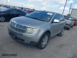 2008 Lincoln MKX with VIN 2LMDU68C48BJ26704, listed as a IAAI auction lot 40707057 with 171,794 mi miles. Bid and sale history available at carsss.com. Image 2.