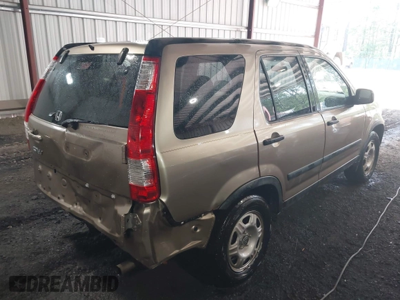 2005 Honda CR-V LX with VIN JHLRD68565C001659, listed as a IAAI auction lot 42162314 with 155,212 mi miles and . Bid and sale history available at carsss.com. Image 4.