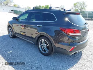 2017 Hyundai Santa Fe SE Ultimate z VIN KM8SR4HFXHU231793, wystawiony jako IAAI lot #41963670 z przebiegiem 132 658 mil mil oraz . Historia ofert i sprzedaży dostępna na DreamBid. Obrazek 3.
