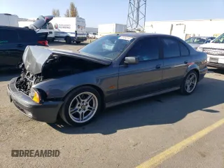 2000 BMW 5 Series 540i with VIN WBADN5341YGC94123, listed as a Copart auction lot 83599214 with 138,932 mi miles and Salvage Title. Bid and sale history available at carsss.com. Image 1.