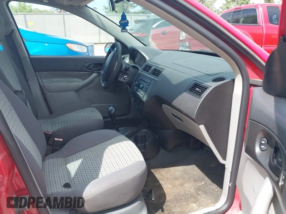 2007 Ford Focus S z VIN 1FAFP34N17W299881, wystawiony jako IAAI lot #42282442 z przebiegiem 144 782 mil mil oraz . Historia ofert i sprzedaży dostępna na DreamBid. Obrazek 5.