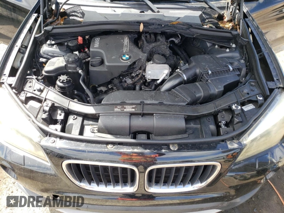 2014 BMW X1 xDrive28i z VIN WBAVL1C5XEVY16263, wystawiony jako Copart lot #52242225 z przebiegiem 154 951 mil mil oraz Szkoda całkowita • Salvage title. Historia ofert i sprzedaży dostępna na DreamBid. Obrazek 12.