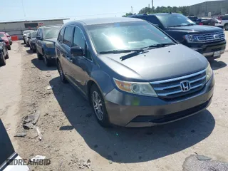 2012 Honda Odyssey EX with VIN 5FNRL5H49CB139262, listed as a IAAI auction lot 42024256 with 124,695 mi miles. Bid and sale history available at carsss.com. Image 1.