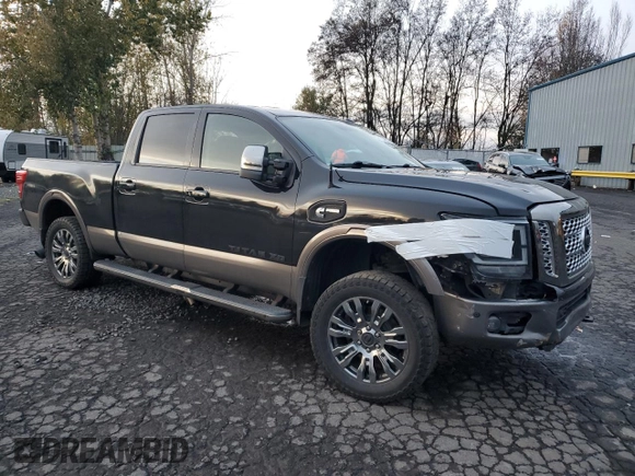 2019 Nissan Titan XD SL with VIN 1N6BA1F43KN521254, listed as a Copart auction lot 81137814 with 74,769 mi miles and Salvage Title. Bid and sale history available at carsss.com. Image 4.
