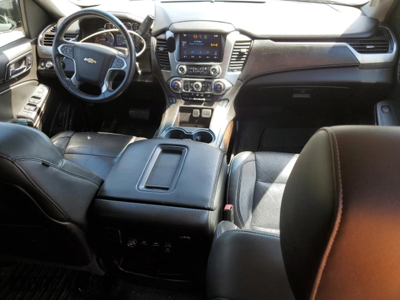 2015 Chevrolet Tahoe LT z VIN 1GNSKBKC6FR156951, wystawiony jako Copart lot #54666335 z przebiegiem 156 139 mil mil oraz Szkoda całkowita • Salvage title. Historia ofert i sprzedaży dostępna na DreamBid. Obrazek 8.