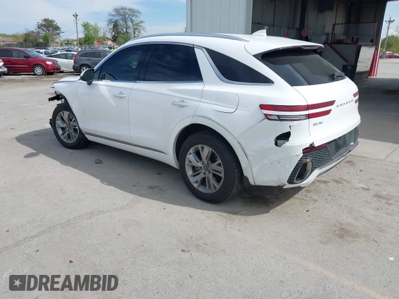 2022 Genesis GV70 2.5T with VIN KMUMADTB0NU043317, listed as a IAAI auction lot 42222034 with 30,566 mi miles and . Bid and sale history available at DreamBid. Image 3.