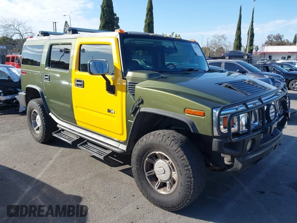 2003 Hummer H2 z VIN 5GRGN23UX3H124727, wystawiony jako IAAI lot #41697787 z przebiegiem 241 554 mil mil oraz . Historia ofert i sprzedaży dostępna na DreamBid. Obrazek 1.
