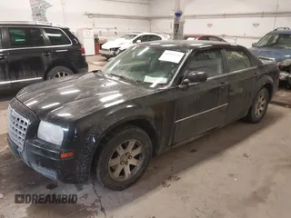2007 Chrysler 300 with VIN 2C3LA43R17H860639, listed as a IAAI auction lot 41481326 with 163,837 mi miles. Bid and sale history available at carsss.com. Image 17.