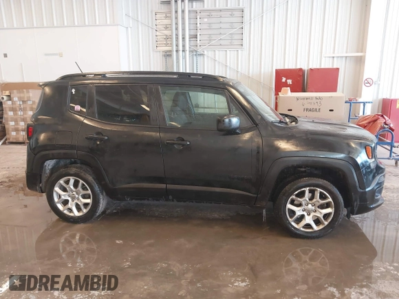 2017 Jeep Renegade Latitude with VIN ZACCJBBB4HPF21586, listed as a IAAI auction lot 41563503 with 134,606 mi miles. Bid and sale history available at carsss.com. Image 13.