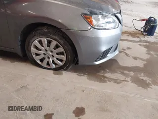 2019 Nissan Sentra S z VIN 3N1AB7AP0KY458040, wystawiony jako IAAI lot #42233788 z przebiegiem 110 419 mil mil oraz . Historia ofert i sprzedaży dostępna na DreamBid. Obrazek 18.
