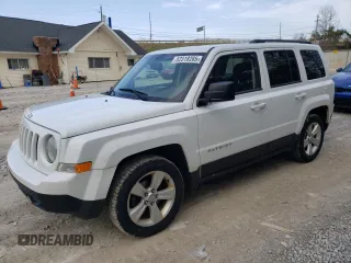 2014 Jeep Patriot Latitude with VIN 1C4NJPFB1ED889282, listed as a Copart auction lot 52318265 with 122,271 mi miles and Salvage title. Bid and sale history available at DreamBid. Image 1.