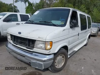1999 Ford Econoline Cargo with VIN 1FDRE14WXXHB72976, listed as a IAAI auction lot 37688871 with 135,319 mi miles. Bid and sale history available at carsss.com. Image 2.