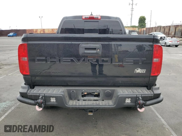 2021 Chevrolet Colorado 4WD ZR2 with VIN 1GCGTEEN3M1293299, listed as a Copart auction lot 59809995 with 21,890 mi miles and Salvage title. Bid and sale history available at DreamBid. Image 6.