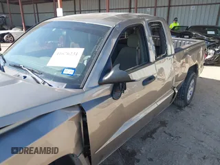 2006 Dodge Dakota SLT with VIN 1D7HE42K16S666071, listed as a IAAI auction lot 41676231 with 129,977 mi miles and . Bid and sale history available at carsss.com. Image 6.