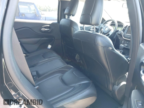 2016 Jeep Cherokee Limited with VIN 1C4PJMDB7GW318803, listed as a IAAI auction lot 42288603 with 170,103 mi miles and . Bid and sale history available at DreamBid. Image 8.