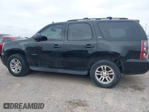 2009 GMC Yukon SLT w/4SA with VIN 1GKFC33J39R295065, listed as a IAAI auction lot 41514132 with 216,680 mi miles. Bid and sale history available at carsss.com. Image 14.