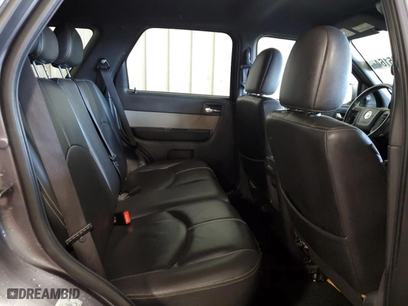 2010 Mercury Mariner Premier with VIN 4M2CN9H70AKJ24788, listed as a Copart auction lot 63035164 with 153,957 mi miles and Salvage Title. Bid and sale history available at carsss.com. Image 11.
