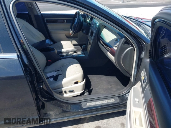 2009 Lincoln MKZ with VIN 3LNHM26T19R615833, listed as a IAAI auction lot 42062684 with 144,940 mi miles and . Bid and sale history available at DreamBid. Image 5.