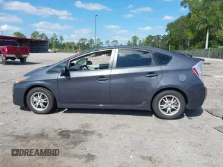 2011 Toyota Prius I with VIN JTDKN3DUXB1404431, listed as a IAAI auction lot 42045275 with 101,293 mi miles. Bid and sale history available at carsss.com. Image 14.