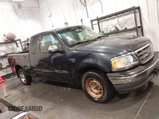 2001 Ford F-150 XL z VIN 1FTRX17L61NB44147, wystawiony jako IAAI lot #41464804 z przebiegiem 130 860 mil mil oraz . Historia ofert i sprzedaży dostępna na DreamBid. Obrazek 14.