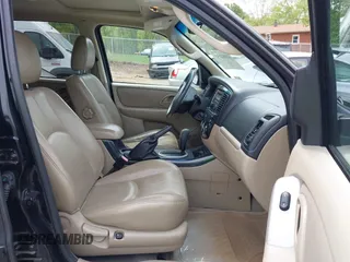 2005 Mazda Tribute S with VIN 4F2CZ96185KM16560, listed as a IAAI auction lot 42065748 with 84,584 mi miles and . Bid and sale history available at carsss.com. Image 5.