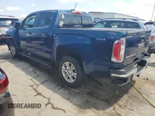2020 GMC Canyon 4WD SLE with VIN 1GTG6CEN6L1154424, listed as a Copart auction lot 62439064 with 86,739 mi miles and Salvage Title. Bid and sale history available at carsss.com. Image 2.