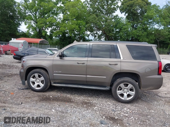 2015 Chevrolet Tahoe LT with VIN 1GNSCBKC5FR585138, listed as a IAAI auction lot 42420496 with 177,104 mi miles and . Bid and sale history available at DreamBid. Image 14.