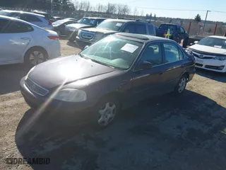 2000 Honda Civic EX with VIN 1HGEJ8649YL034008, listed as a IAAI auction lot 41691792 with 196,593 mi miles. Bid and sale history available at carsss.com. Image 2.